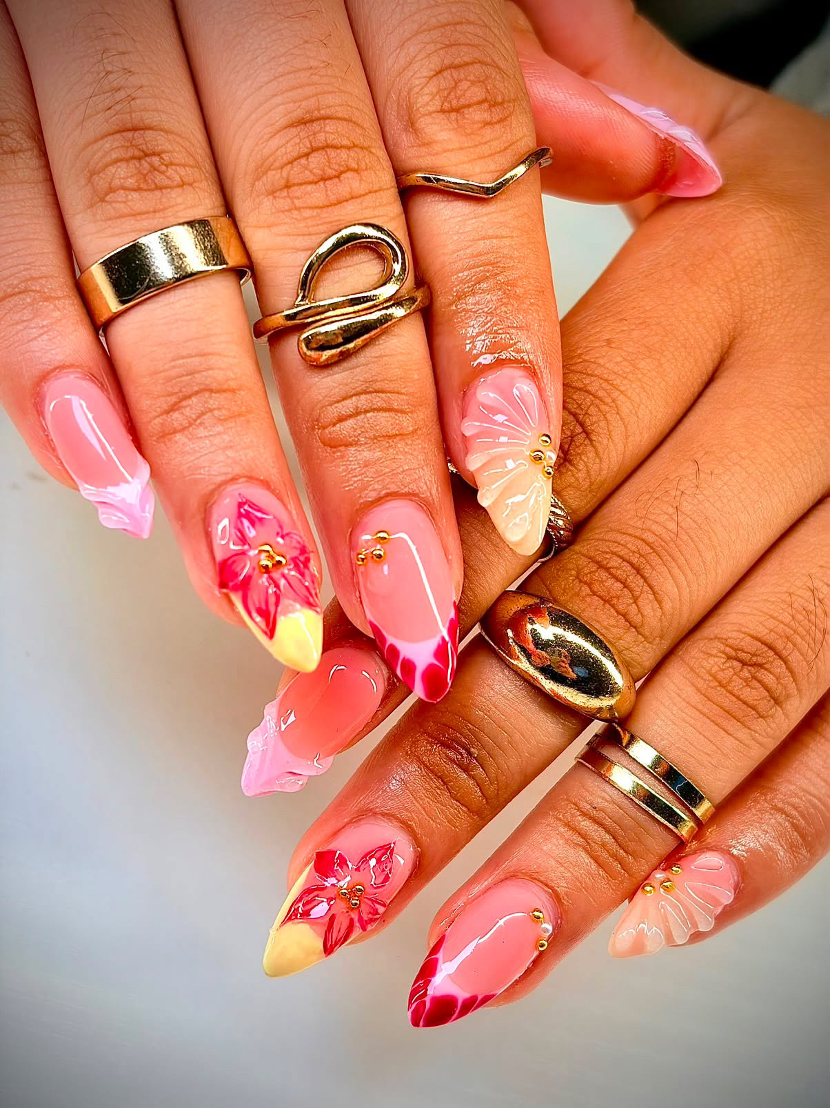 Almond Gel-X set in soft pinks with 3D hand-painted florals and gold beads